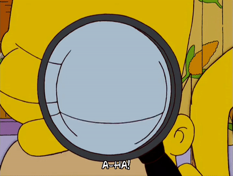 looking with a magnifying glass